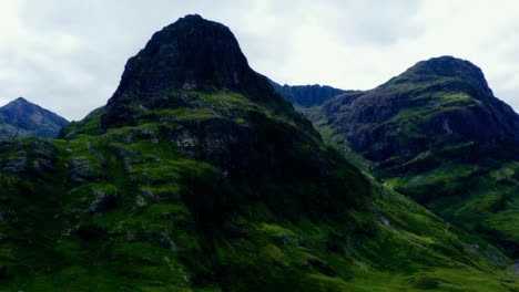 Aerial-Drone-Shot-of-The-Three-Sisters-in-Glen-Coe,-Scotland-01
