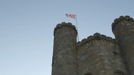 Great-Britain-Flag-on-Tower-with-Blue-Sky