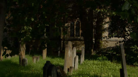 Tracking-Shot-of-Saint-Mary-Magdalen-Church-Graveyard-