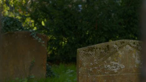 Tracking-Shot-of-Grave-Headstones-In-Oxford-Graveyard