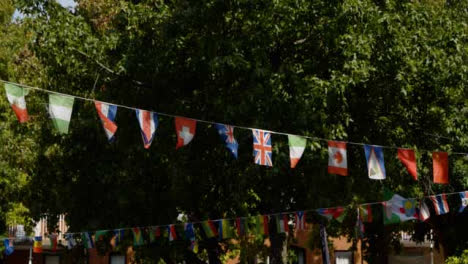 Tilting-Shot-of-Flag-Bunting-at-Gloucester-Green-Outdoor-Market-In-Oxford