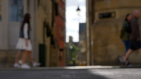 Defocused-Shot-of-Pedestrians-and-Traffic-On-High-Street-In-Oxford-England-02