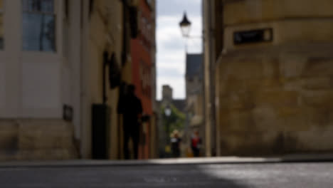 Defocused-Shot-of-Pedestrians-and-Traffic-On-High-Street-In-Oxford-01