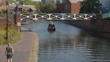 Panning-Shot-of-Canal-Boat-In-Birmingham-Canal-