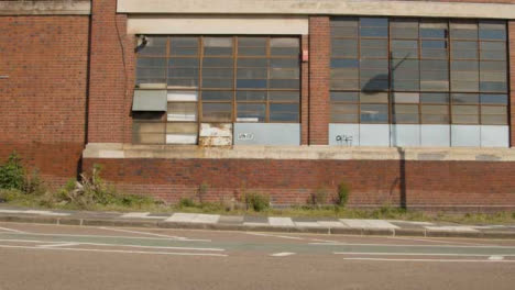 Wide-Shot-of-Dilapidated-Warehouse-Wall-In-Birmingham