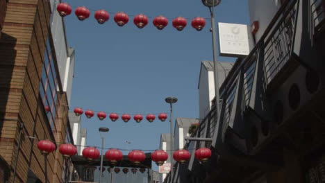 Tracking-Shot-of-Chinese-Lanterns-Hanging-from-Buildings-