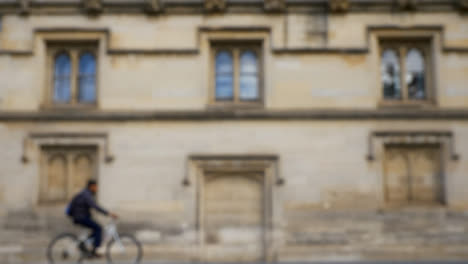 Defocused-Shot-of-Traffic-and-People-Travelling-Down-High-Street-In-Oxford-01