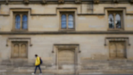 Defocused-Shot-of-Traffic-and-People-Travelling-Down-High-Street-In-Oxford-03