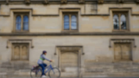Defocused-Shot-of-Traffic-and-People-Travelling-Down-High-Street-In-Oxford-04