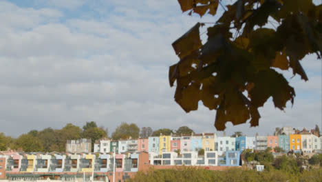 Tilting-Shot-of-Colourful-Waterside-Town-Houses-In-Bristol-England