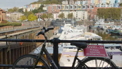 Wide-Shot-of-Bicycle-Locked-Against-Railing-at-Bristol-Marina-