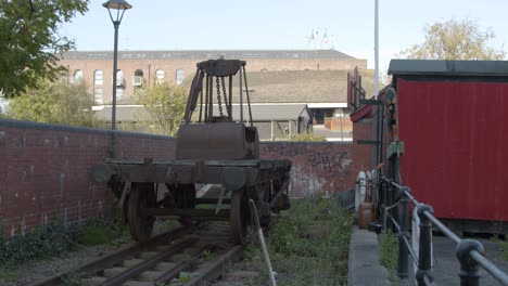 Sliding-Shot-of-Old-and-Disused-Industrial-Railway-Cart-In-Bristol-England