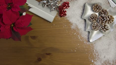 Overhead-of-Christmas-Themed-Table-Surface-Background-with-Left-Central-Copy-Espacio
