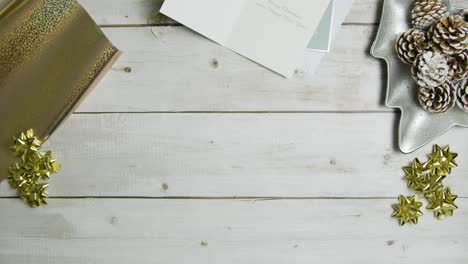 Overhead-View-Shot-of-Christmas-Themed-Table-Surface-Background-with-Central-Copy-Space