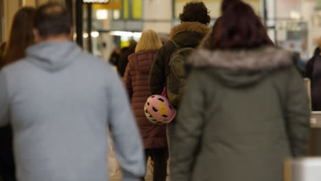 Long-Shot-of-People-Walking-Into-Shopping-Centre-In-Oxford-England
