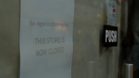 Close-Up-Shot-of-Closure-Sign-On-Front-of-Store-In-Oxford-England