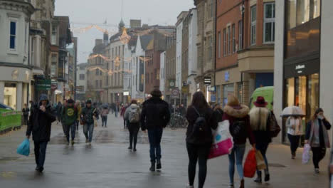 Wide-Shot-of-People-Walking-Down-a-Busy-Street-In-Oxford-England