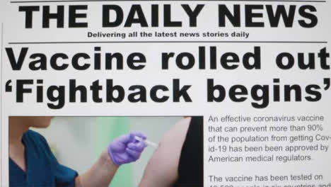 Dolly,-Nahaufnahme-Eines-Nachrichtenartikels-Zum-Covid-19-Impfstoff-Auf-Einem-Computerbildschirm