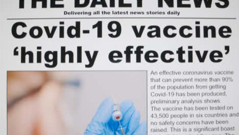 Close-Up-Shot-of-Scrolling-Covid-19-Vaccine-News-Articles-On-Computer-Screen