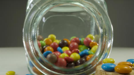 Sliding-Extreme-Close-Up-Shot-Into-Jar-of-Colourful-Chocolates