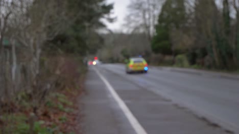 Handheld-Pull-Focus-Shot-of-Paramedic-Car-In-Oxford