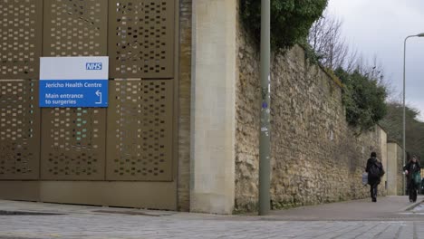 Low-Angle-Wide-Shot-of-Jericho-Health-Centre-Sign-In-Oxford-