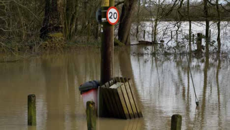 Handheld-Shot-of-Submerged-Electrical-Pole-and-Surrounding-Flood