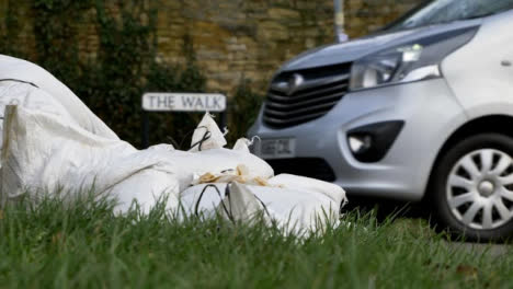 Close-Up-Shot-of-Sandbags-On-Roadside-In-Flooded-Village