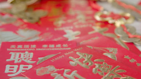 Sliding-Close-Up-Shot-of-a-Pile-of-Chinese-New-Year-Red-Envelopes