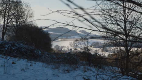 Sliding-Shot-of-Vast-Snow-Covered-Countryside-Landscape