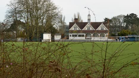 Long-Shot-of-Cricket-Pavilion-In-Park-
