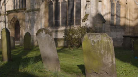 Tracking-Shot-Approaching-Graves-In-Church-Yard-