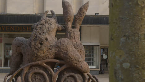 Sliding-Shot-Revealing-The-Hare-and-The-Minotaur-Statue-