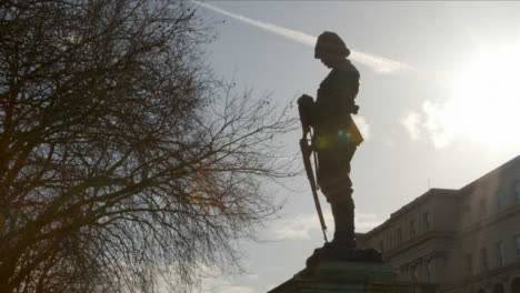 Tracking-Shot-Looking-Up-at-Silhouetted-Boer-War-Memorial