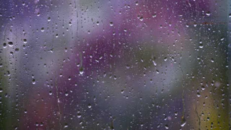 Close-Up-Shot-of-Rain-Droplets-On-Window