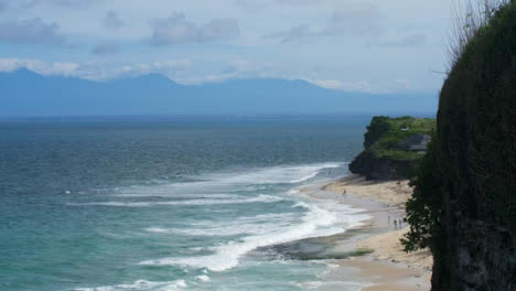 Wide-Shot-of-Waves-On-the-Uluwatu-Shores