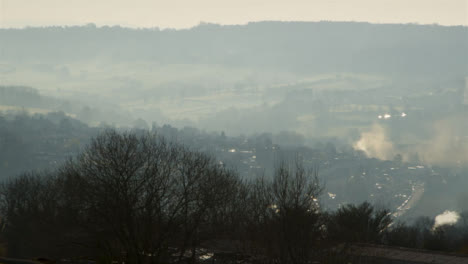 Long-Shot-of-Misty-Countryside-Hills-