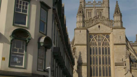 Tracking-Shot-Past-Antique-Store-Revealing-Bath-Abbey