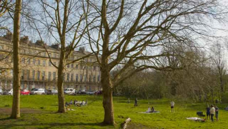 Tracking-Shot-of-Pedestrians-On-Green-Space-Near-Norfolk-Crescent