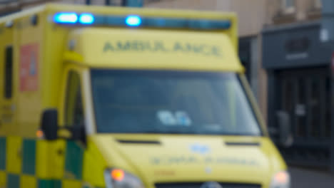 Defocused-Medium-Shot-of-Stationary-Ambulance-