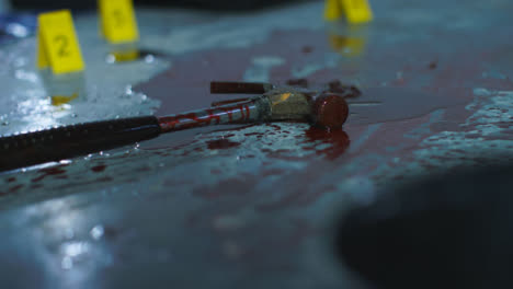 Pull-Focus-Shot-from-Shoe-to-Bloody-Hammer-at-Crime-Scene