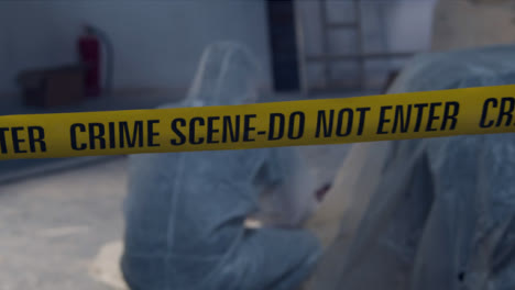 Tracking-Shot-Past-Crime-Scene-Tape-and-Forensic-to-Bloody-Crime-Scene-
