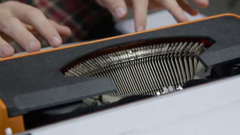 Medium-Shot-of-Typebars-In-Action-On-Typewriter