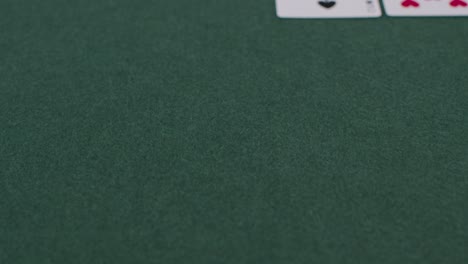 Tracking-Close-Up-Shot-from-Cards-to-Chips-Being-Bet