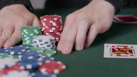 Tracking-Close-Up-Shot-of-Poker-Player-Going-All-In