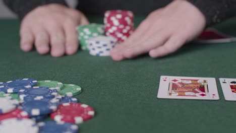 Tracking-Close-Up-Shot-of-Poker-Player-Going-All-In