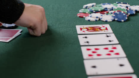 Tracking-Close-Up-Approaching-Community-Cards-as-Poker-Player-Checks