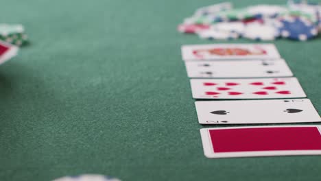 Tracking-Close-Up-Approaching-Pot-as-Poker-Player-Goes-All-In