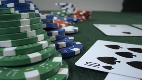 Sliding-Extreme-Close-Up-Shot-of-Poker-Player-Shoving-Pocket-Tens-