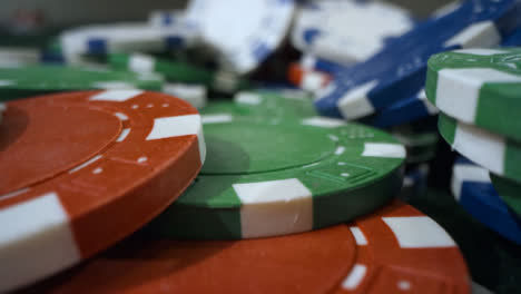 Sliding-Extreme-Close-Up-Shot-Over-Pile-of-Poker-Chips